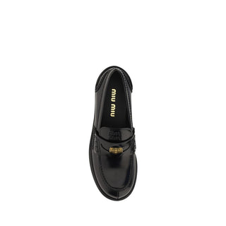 Miu Miu Black Rubber Slip-On Loafers