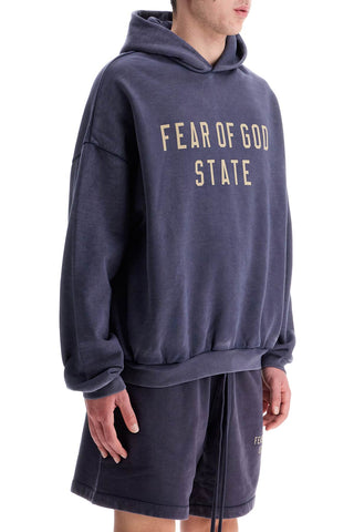 Fear Of God ESSENTIALS navy blue cotton hoodie with minimalist design