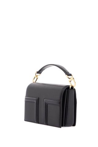 Toteme mini t-flap bag in black calfskin with adjustable strap